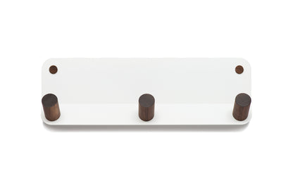 A Fire Road Plane 3 Wall Hook coat rack with three wooden hooks.