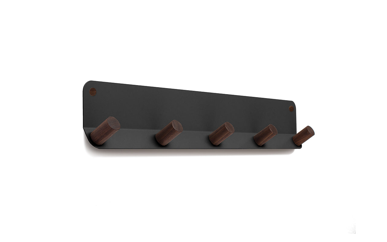 A Fire Road Plane 5 Wall Hook with four wooden pegs for coat hooks.
