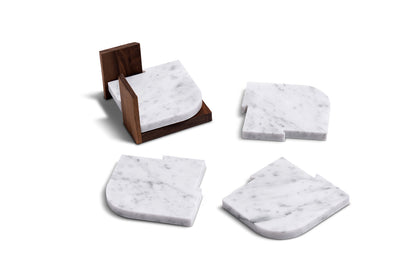 Four Fire Road marble coasters on a white surface perfect for entertaining.