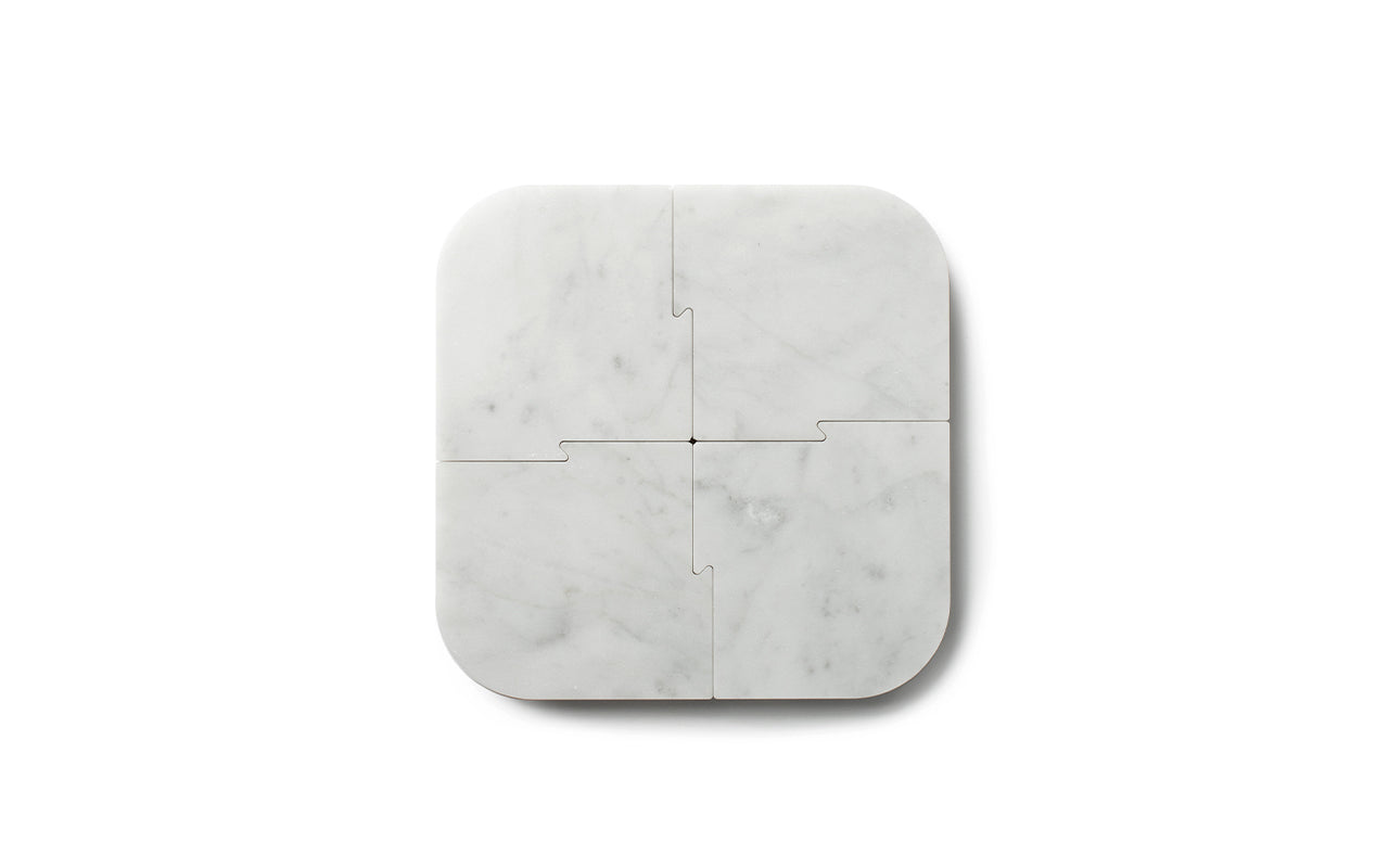 top view of puzzle marble coasters joined into trivet