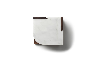 top view of join carrara coasters on walnut stand