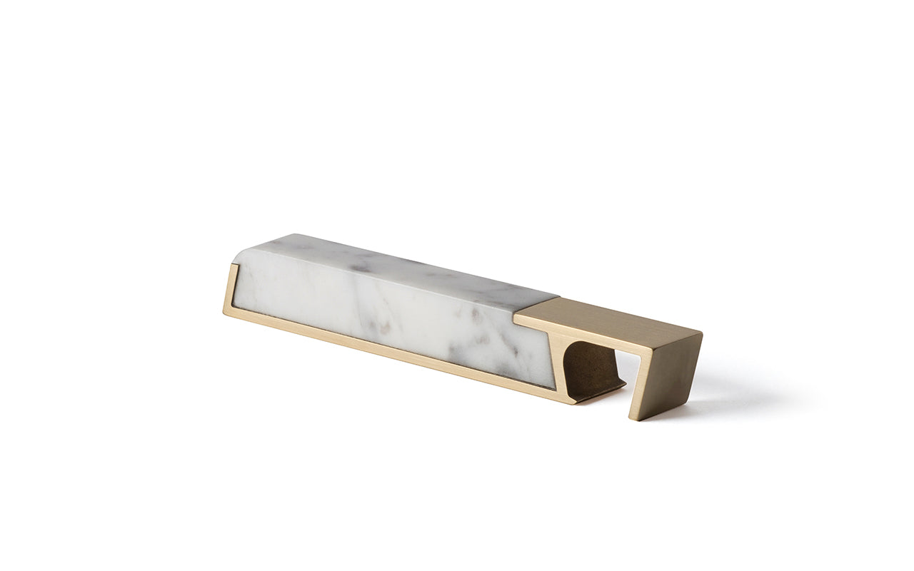 A Fire Road Profile Bottle Opener on a white surface.