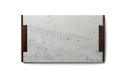 top view of carrara marble serving board with walnut handles