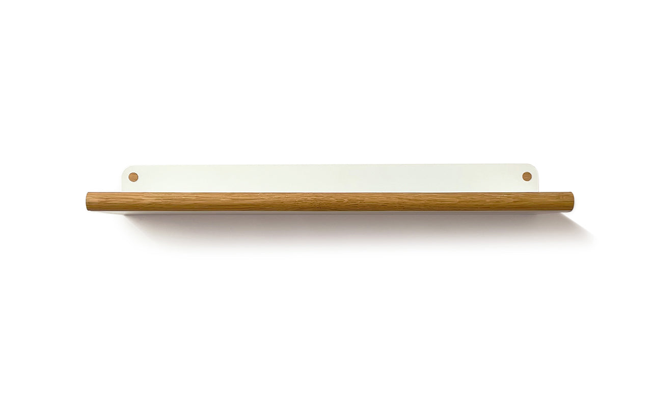 The Fire Road Plane Wall Shelf features a sleek, minimalist design with a white back panel and a natural walnut wood shelf surface.
