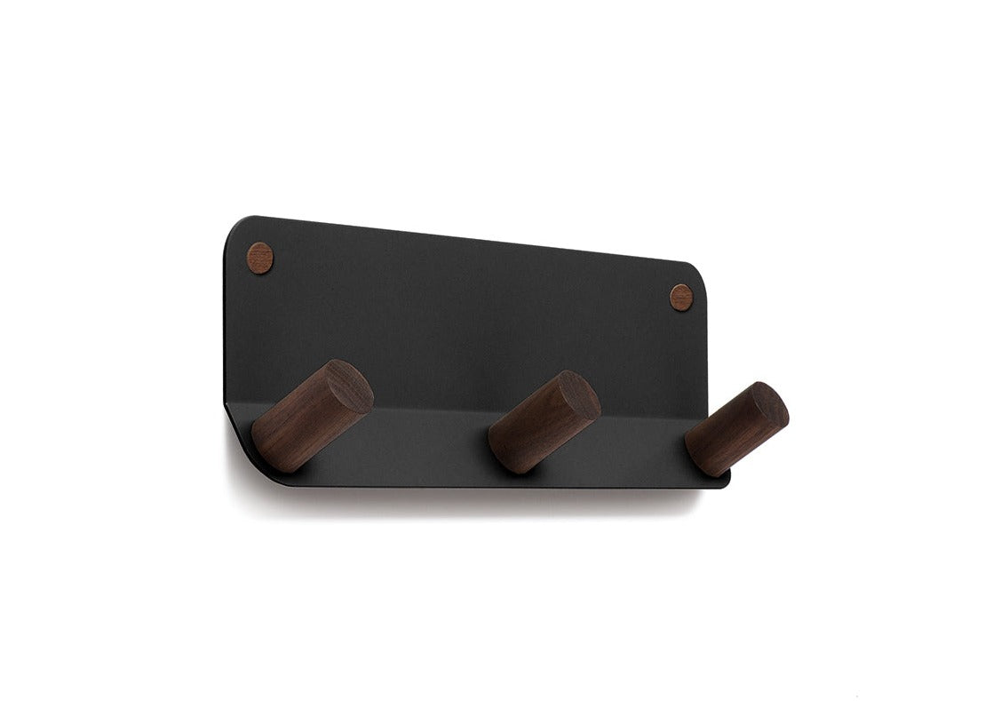 A black Plane 3 Wall Hook coat rack with two wooden hooks by Fire Road.