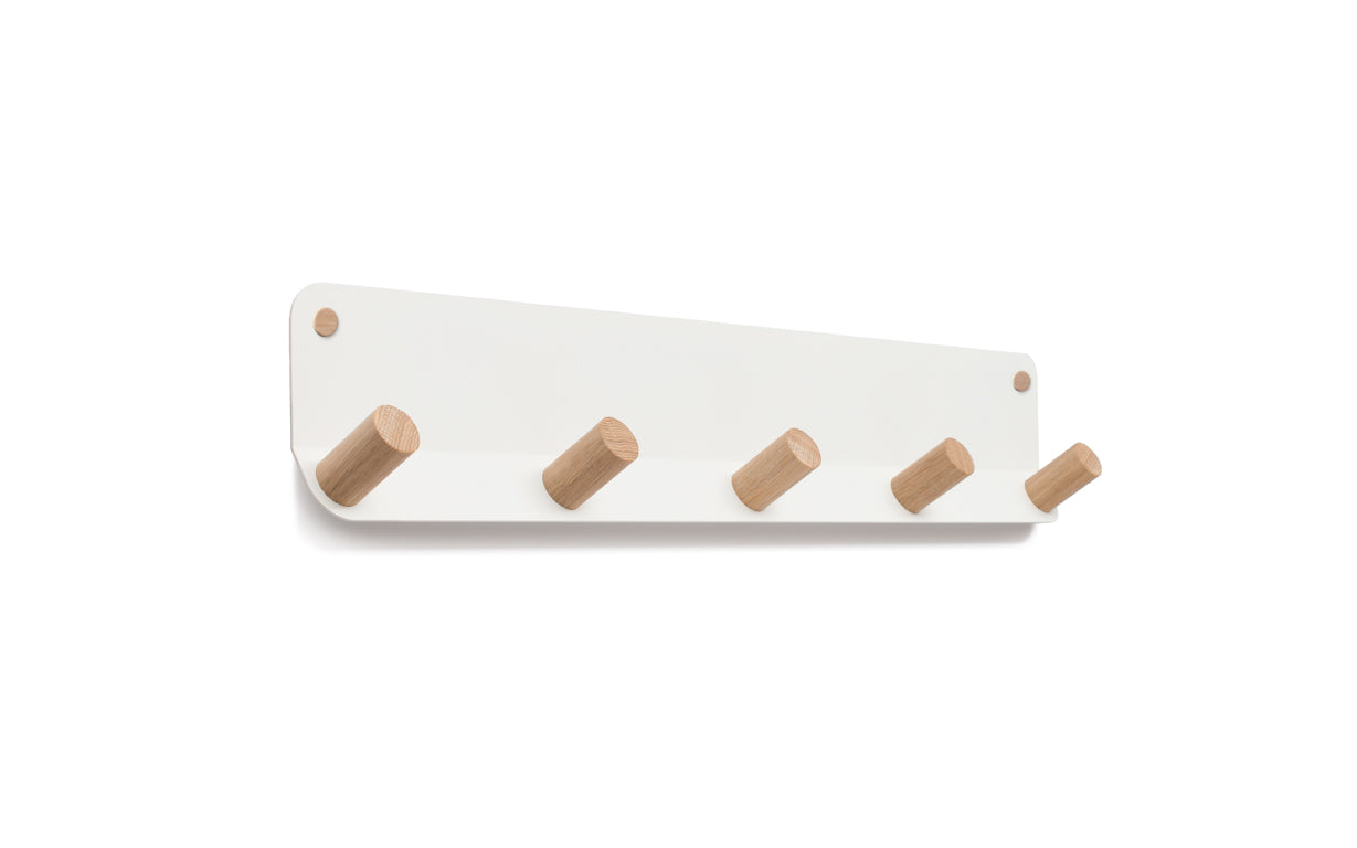 A Fire Road wall-mounted storage with the Plane 5 Wall Hook wooden coat hooks.