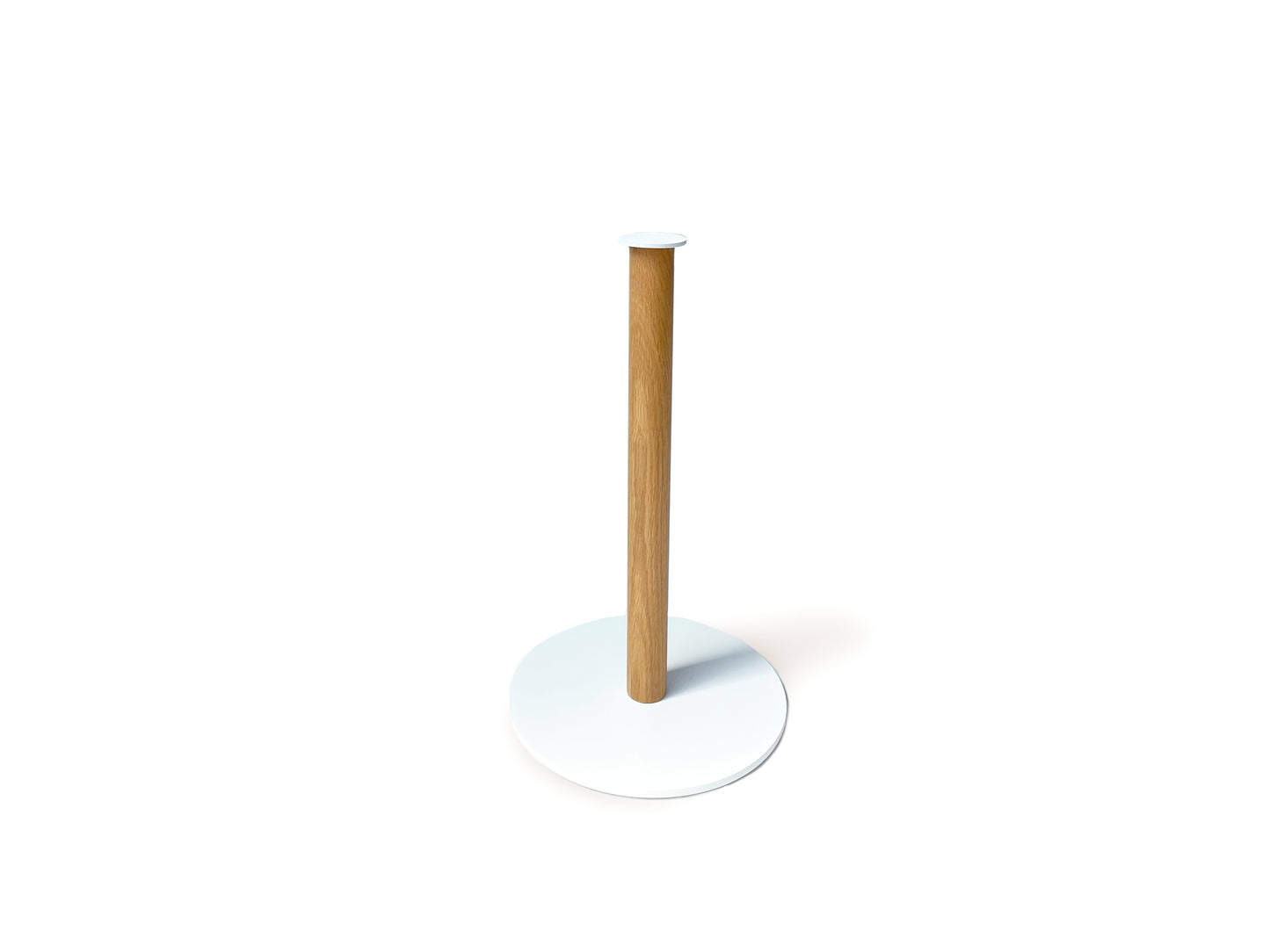 A sustainable paper towel holder, the Plane Paper Towel Holder by Fire Road, featuring a wooden vertical rod and a round white base is shown against a white background, showcasing modern design.