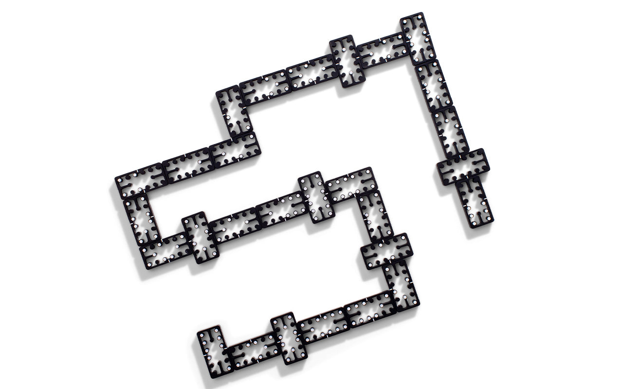 game of double 6 dominos with black aluminum tiles