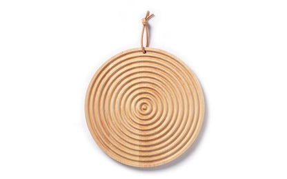 grooved round bread board in maple wood